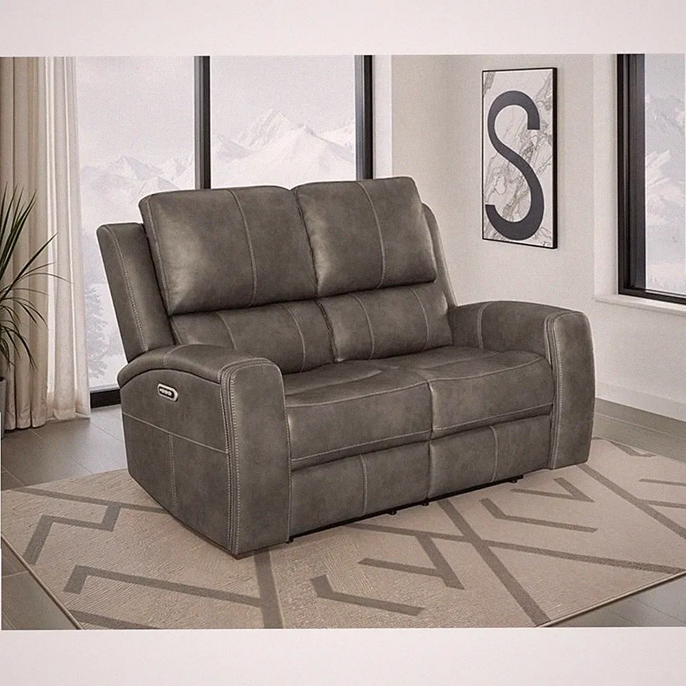 Pemberly Row Faux Leather Triple Power Reclining Loveseat in Charcoal